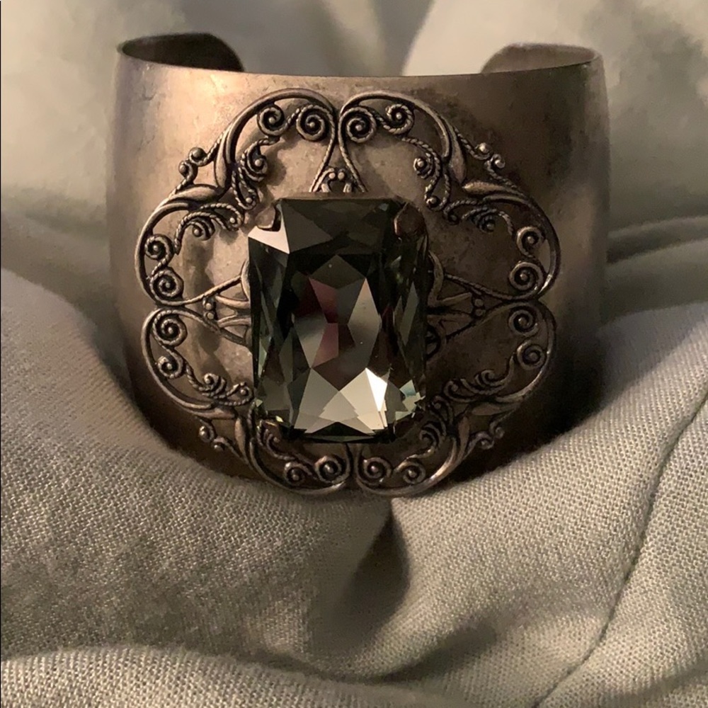 Silver and green stone cuff bracelet.